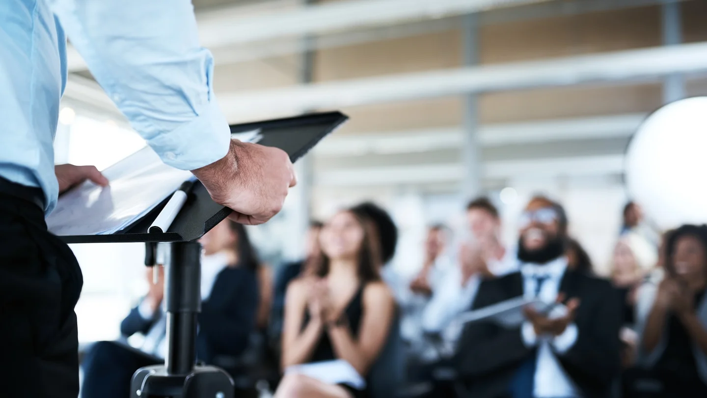 Businessman giving a presentation at a conference