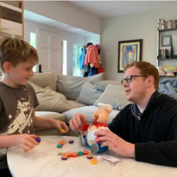 Clinician playing toys with a child